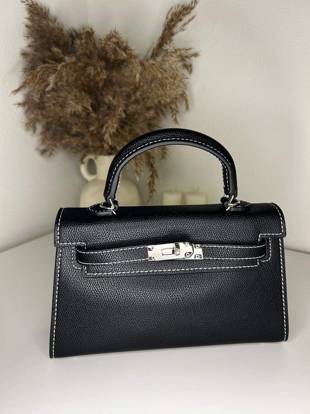 Amhar bag 22 noir surpiqué blanc