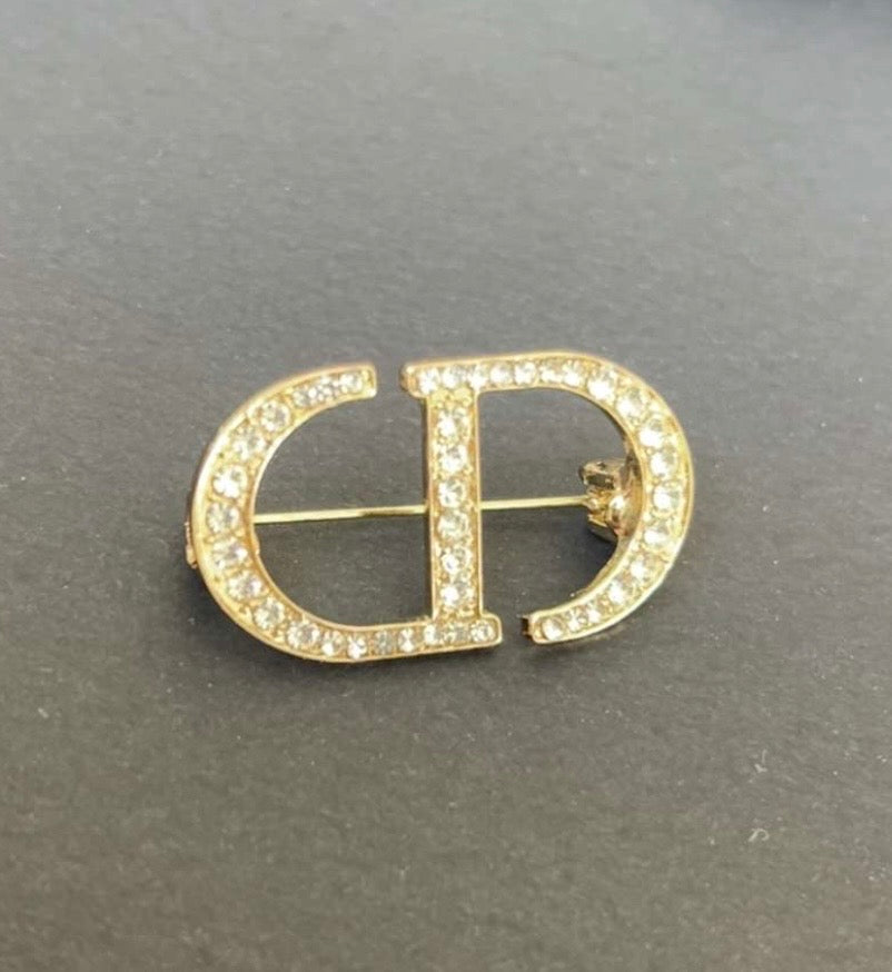 Broche CD