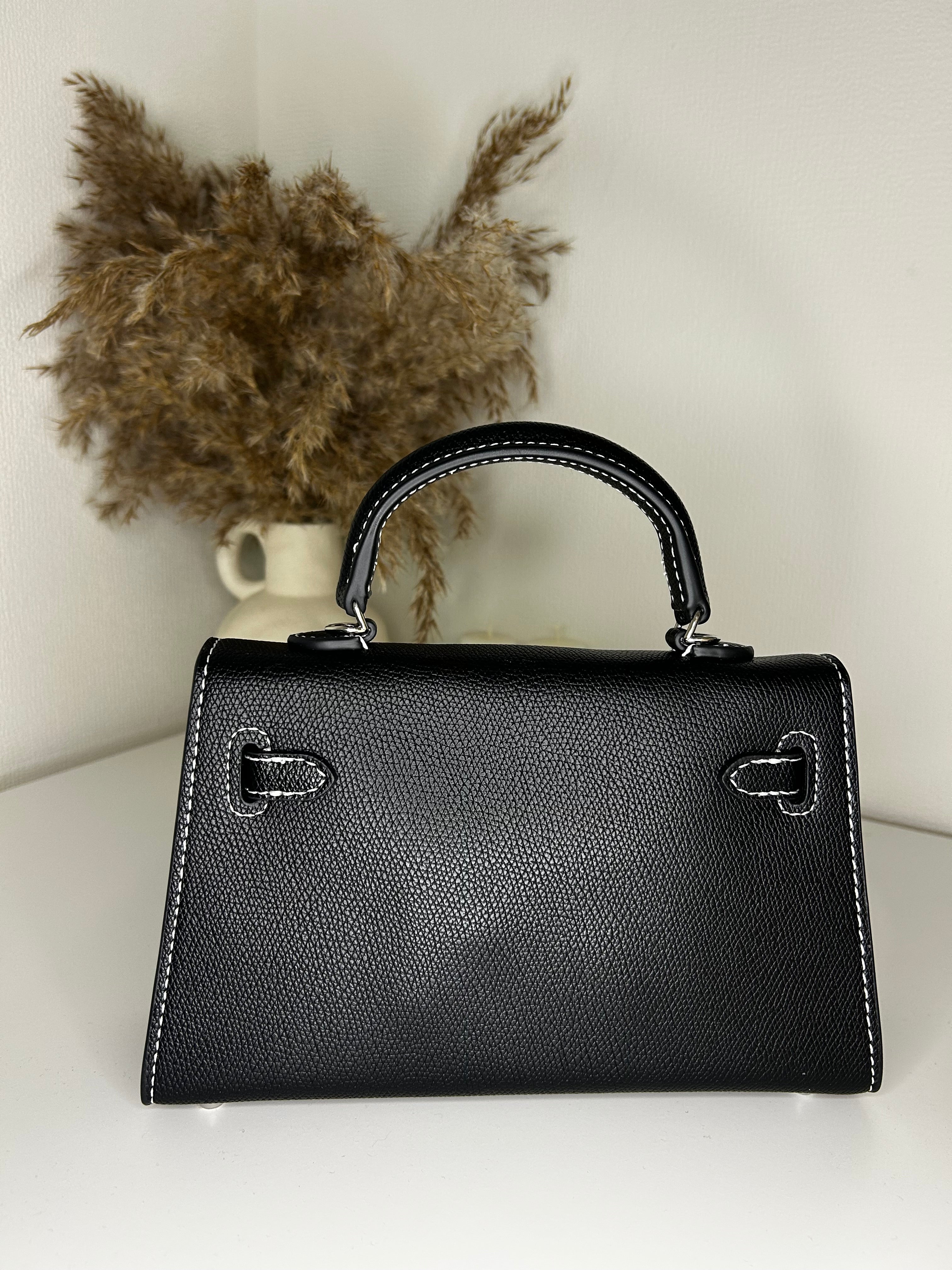 Amhar bag 22 noir surpiqué blanc